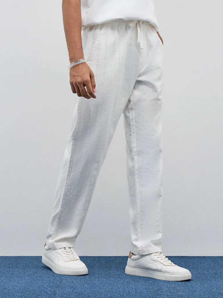 ETA Off-White Textured Relaxed-Fit Mid-Rise Cotton Chinos