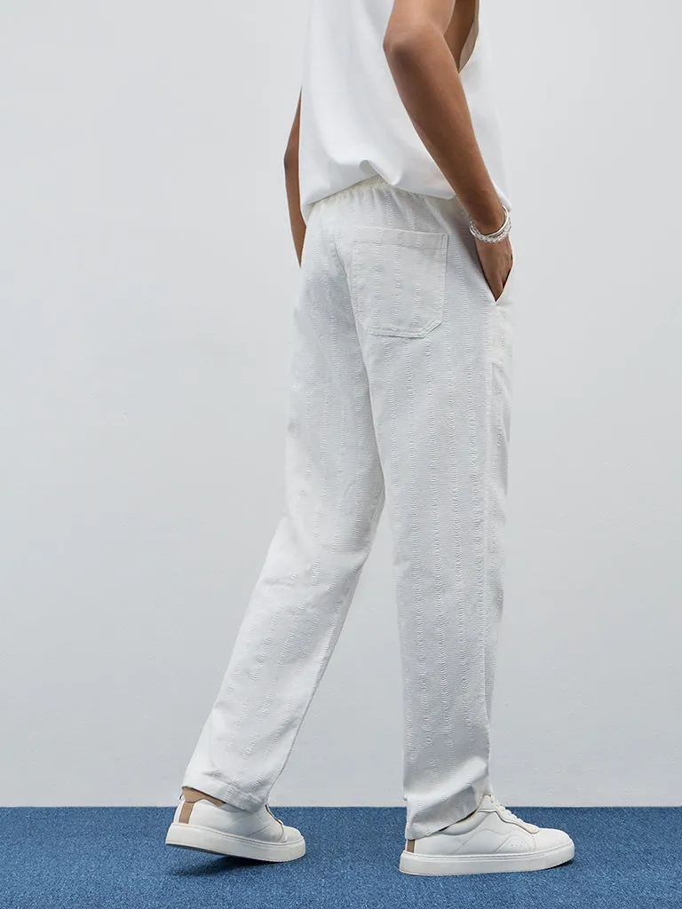 ETA Off-White Textured Relaxed-Fit Mid-Rise Cotton Chinos